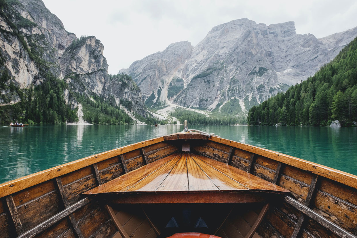 Quisque faucibus laoreet eros vel 1 Boat in mountains